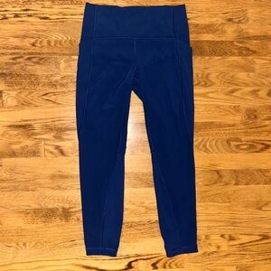 Lululemon navy leggings w/ laser cut design down sides